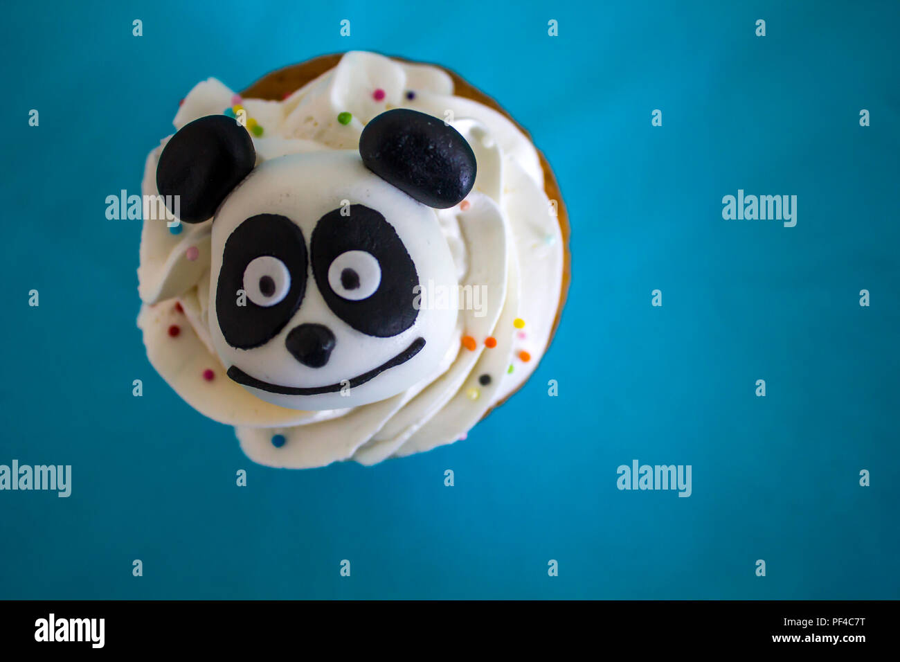 Top view of a cupcake decorated with a panda Stock Photo