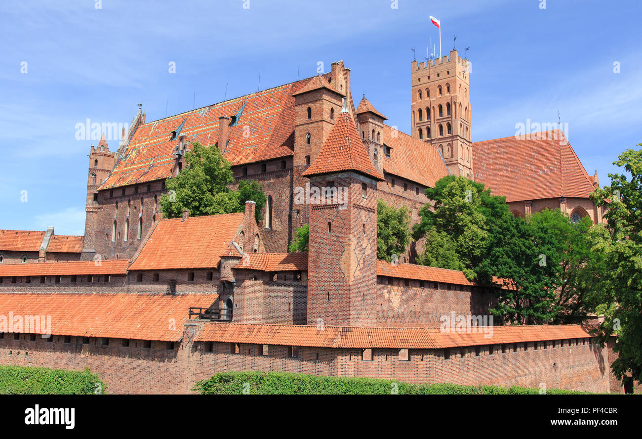 A medieval, built of red brick, castle of Teutonic Order in Malbork, Gdansk Pomerania in Poland. It is the largest brick castle in Europe Stock Photo