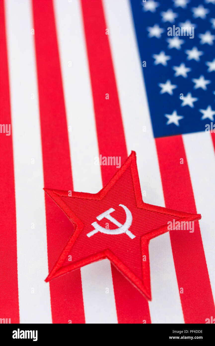 Red Star Hammer and Sickle badge with US / American Stars & Stripes. For US Russia dispute, US Radical Left, Communist America, Democratic Socialists Stock Photo