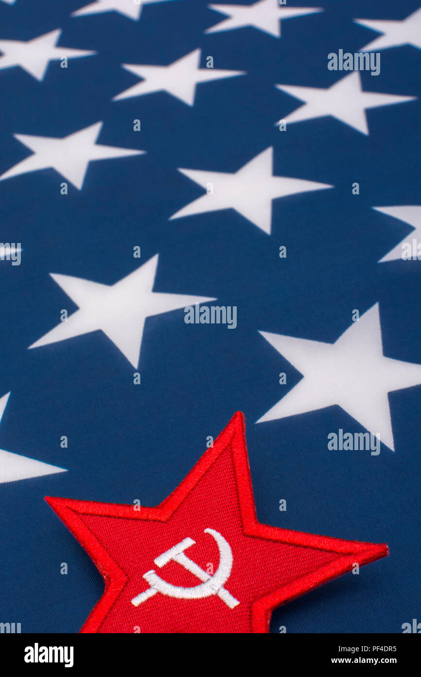 Red Star Hammer and Sickle badge with American Stars & Stripes flag. For US  Radical Left, Communist America, Democratic Socialists, American marxism  Stock Photo - Alamy