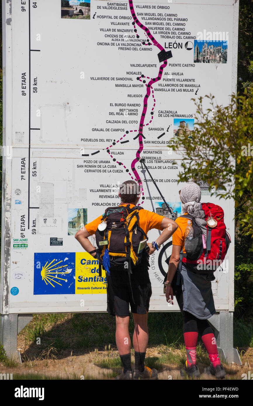 Pilgrims walking the Spanish pilgrimage route the Camino de Santiago the way  of St James stopped to view a display of the route in Castilla y Leon Stock  Photo - Alamy