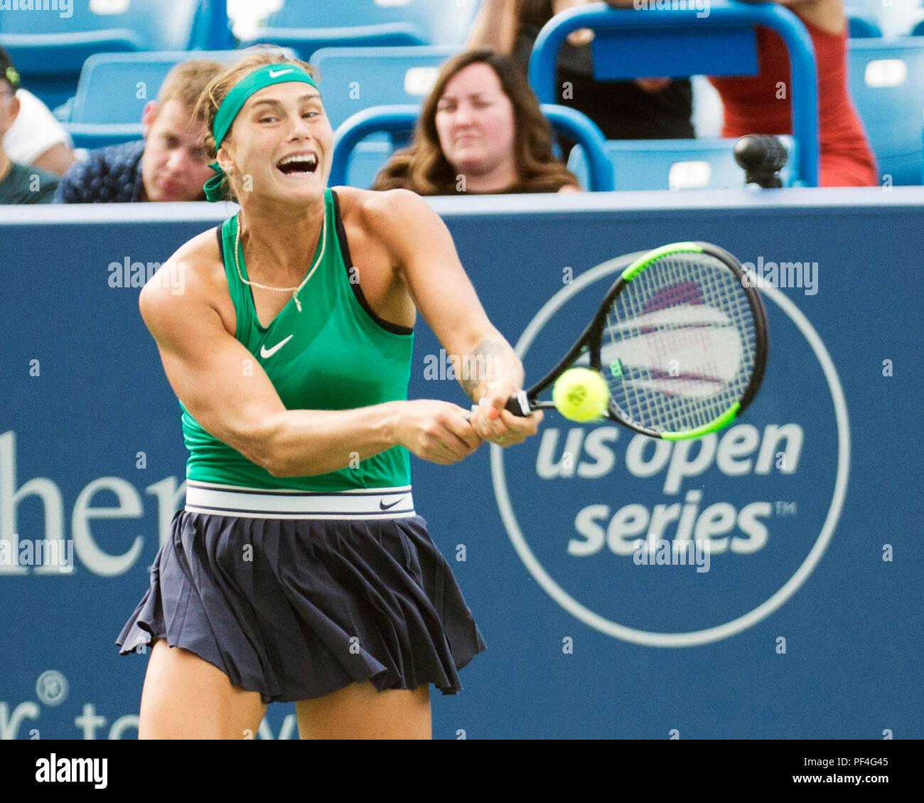 Ohio, USA. 18 August 2018.  Aryna Sabalenka (BLR) hits the ball back to Simona Halep (ROU) at the Western Southern Open in Mason, Ohio, USA. Brent Clark/Alamy Live News Stock Photo