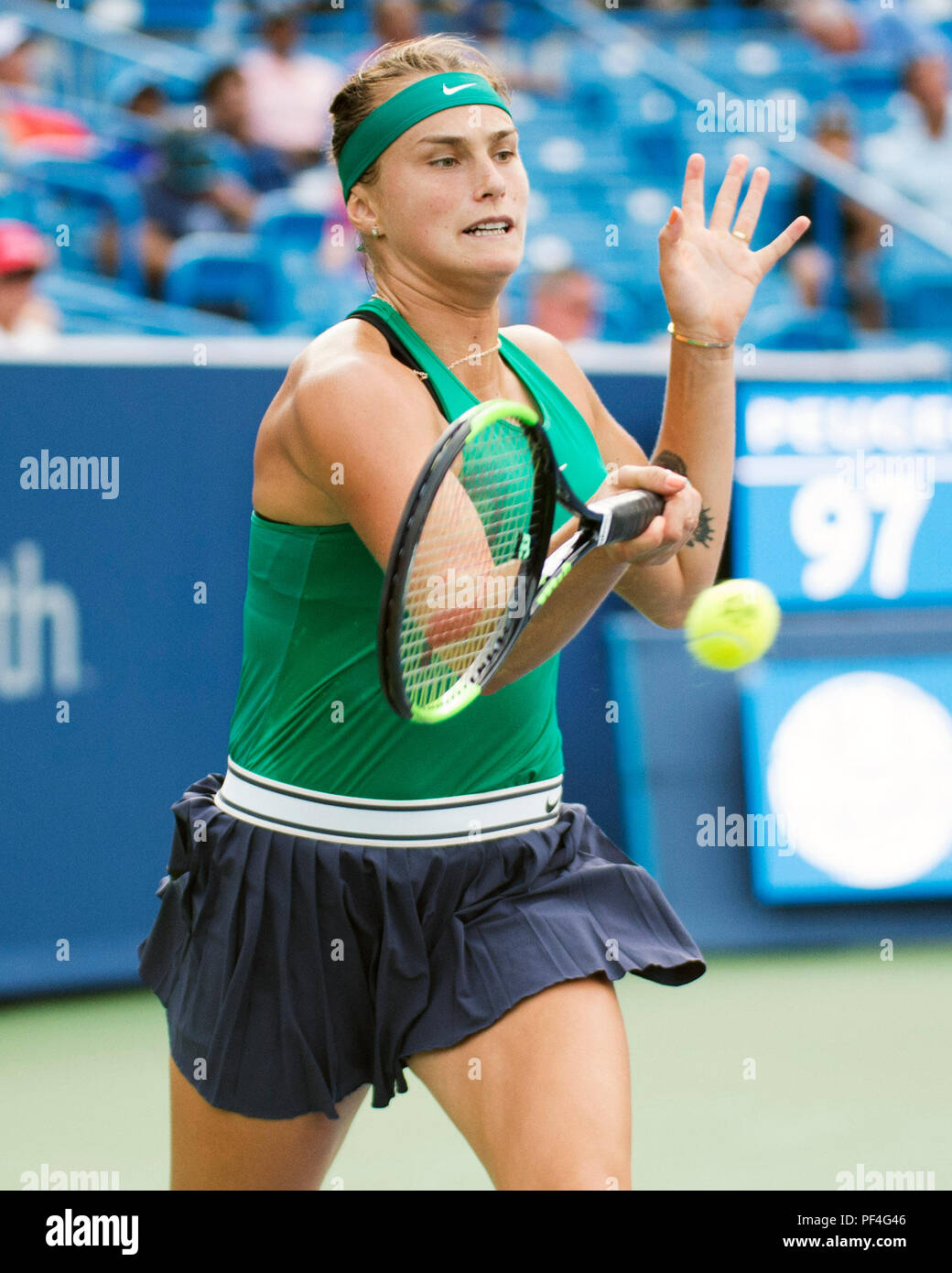 Ohio, USA. 18 August 2018.  Aryna Sabalenka (BLR) hits the ball back to Simona Halep (ROU) at the Western Southern Open in Mason, Ohio, USA. Brent Clark/Alamy Live News Stock Photo