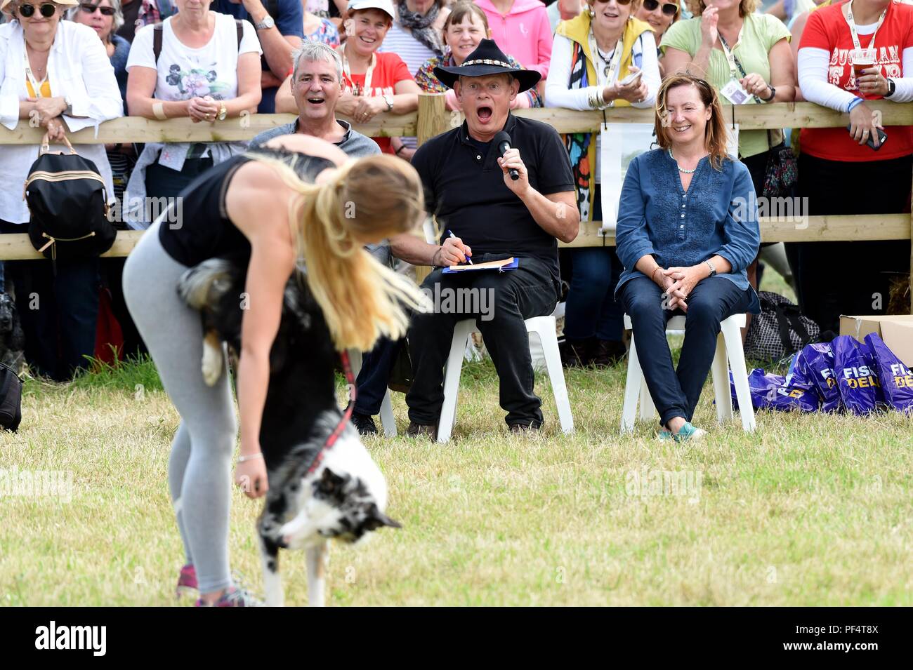 Martin Clunes and Neil Morrissey judge Best Trick in the dog competition Credit: Finnbarr Webster/Alamy Live News Stock Photo