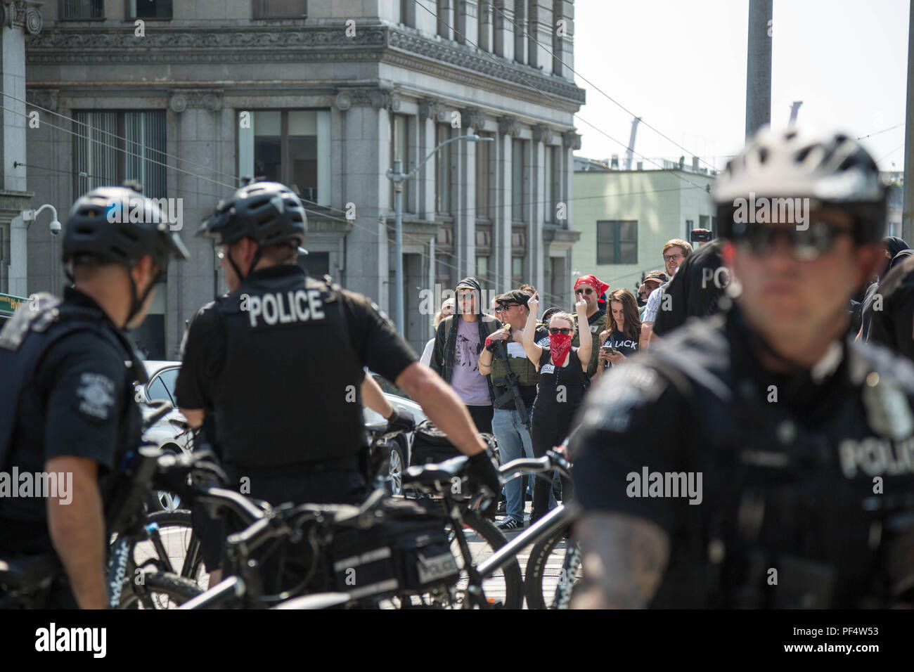 Seattle, WA, USA.  18th August, 2018.  The counterprotesters against pro gun rally being held at the Seattle City Hall Plaza.  Credit: Maria S./Alamy Live News. Stock Photo