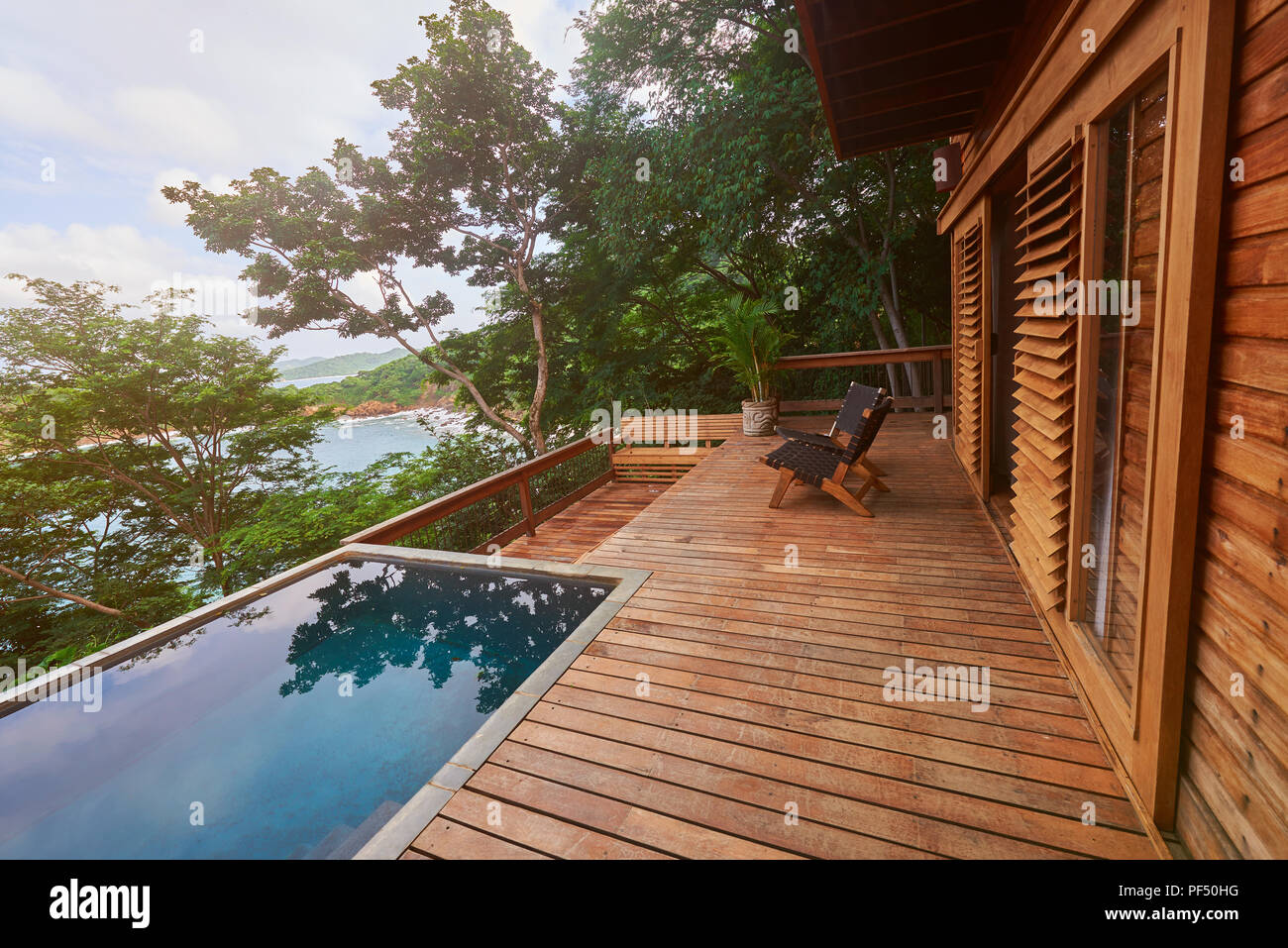 Picture of Wooden deck with pool on natural background Stock Photo - Alamy