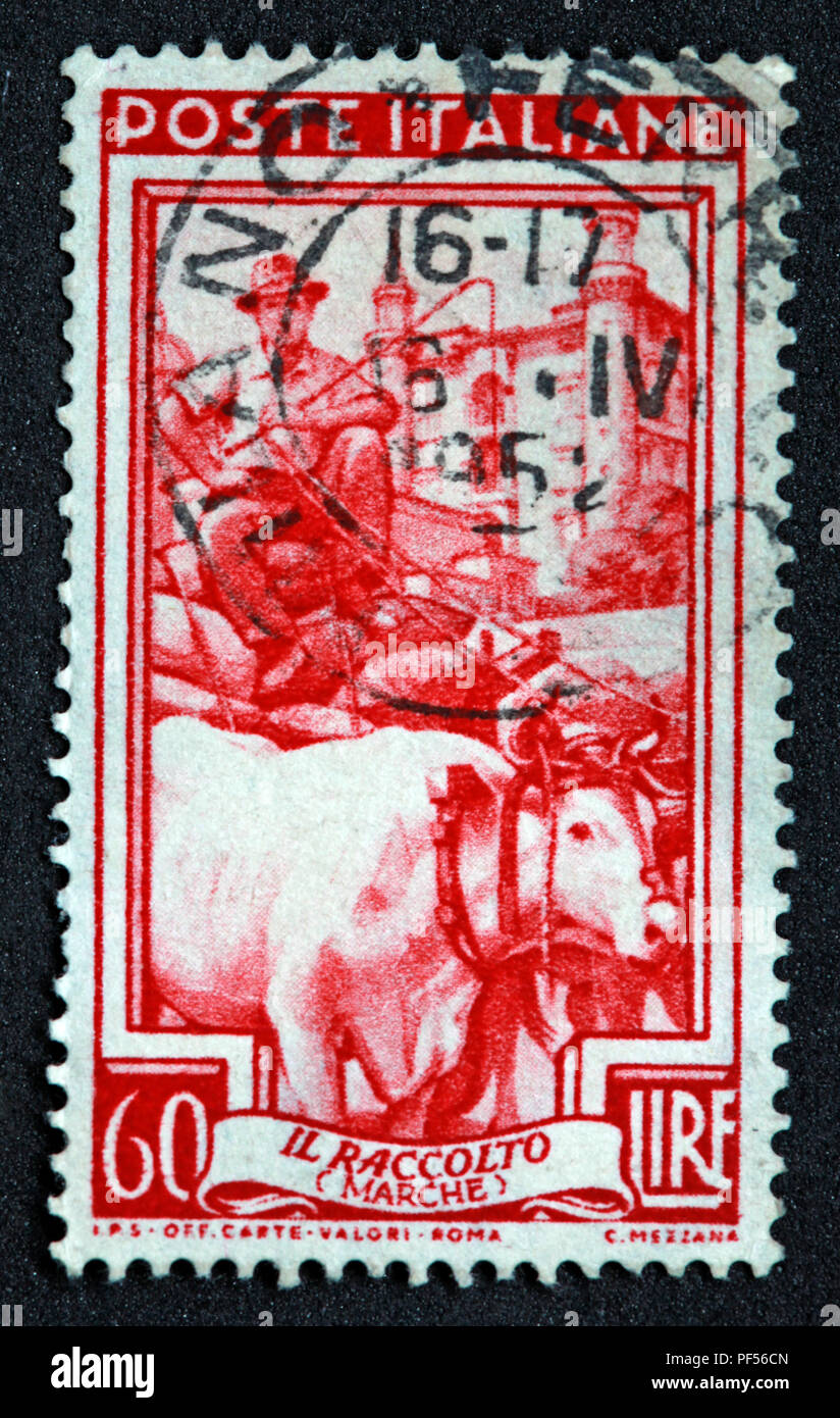 Used 60Lire Post italiane 60Lire Il Raccolto Marche - Italy - red stamp Stock Photo