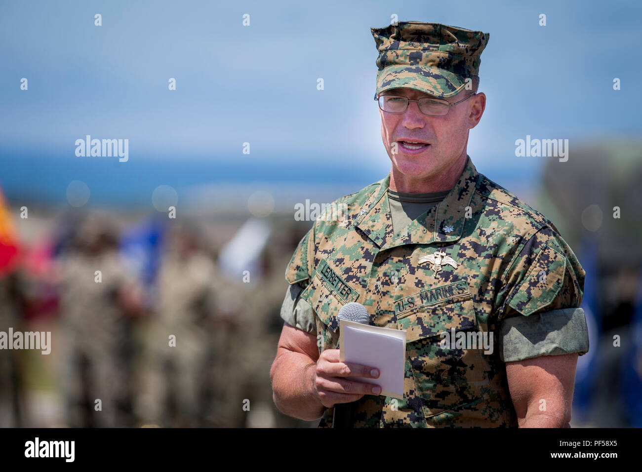 U.S. Marine Corps Lt. Col. Bradley Ledbetter, commanding officer, 1st Marine Raider Support Battalion (1st MRSB), Marine Corps Forces Special Operations Command (MARSOC), gives a speech during 1st MRSB’s relief and appointment ceremony at the battalion’s compound at Marine Corps Base Camp Pendleton, California, Aug. 14, 2018. The passing of the sword signified the transfer of leadership and responsibility from one sergeant major to another. (U.S. Marine Corps photo by Lance Cpl. Betzabeth Y. Galvan) Stock Photo