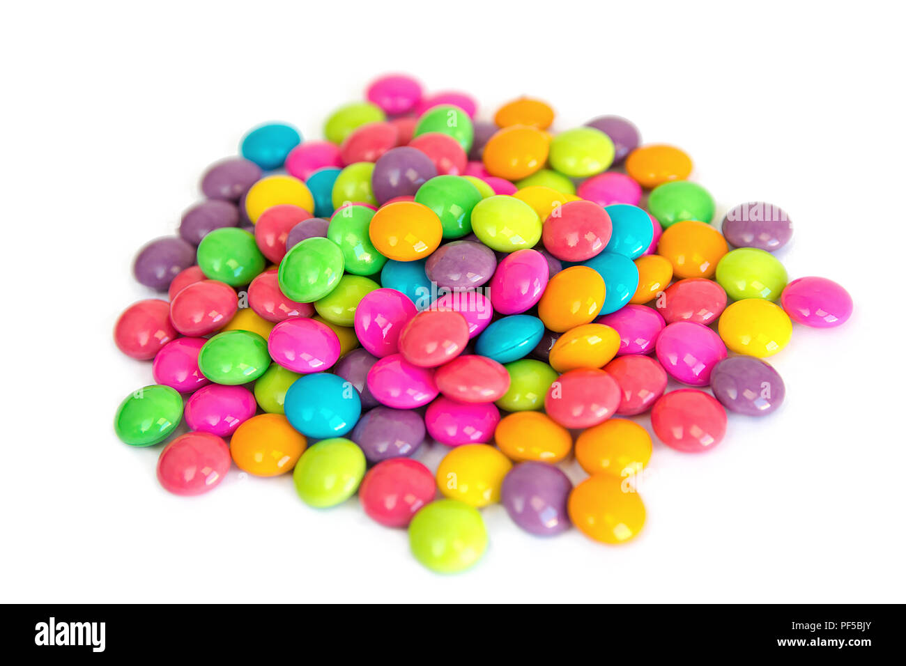 colorful chocolate coated candy isolated on white background Stock