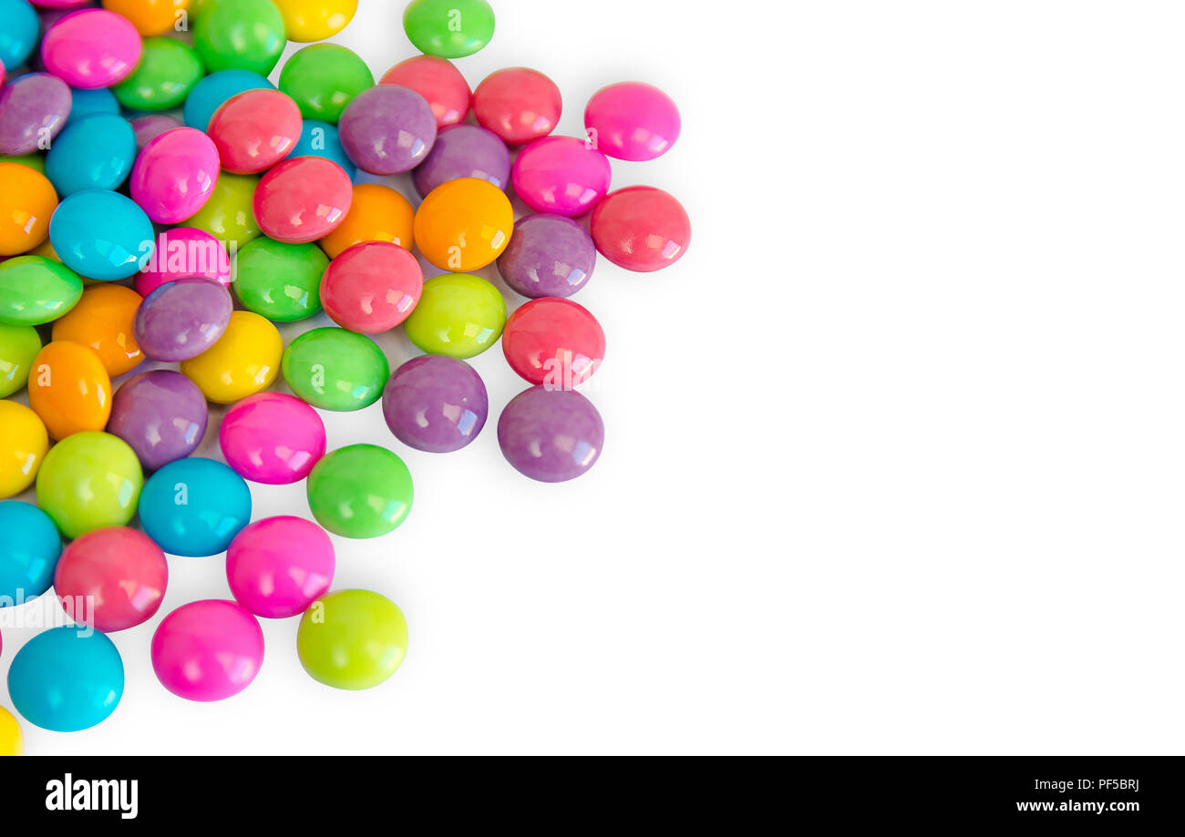 colorful chocolate coated candy isolated on white background. with copy