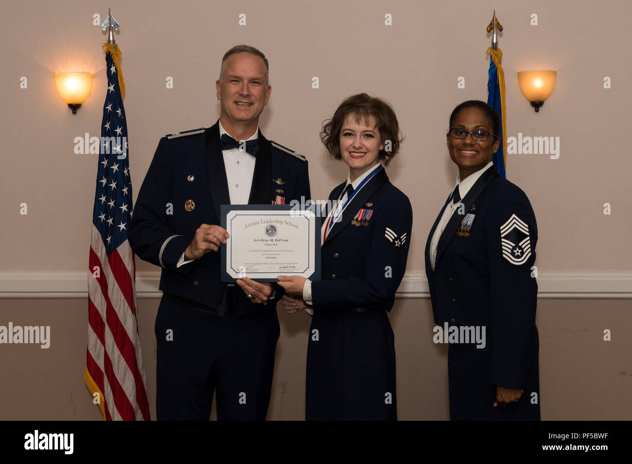 Airmen from class 186 are recognized for their completion of Airman