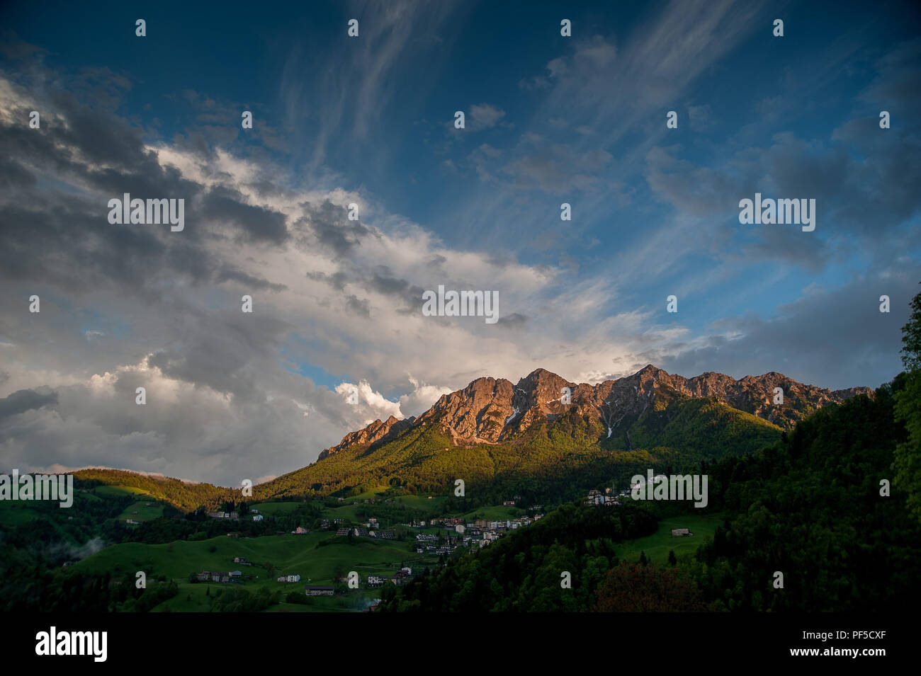 mountain in the clouds after the storm with rainbow Stock Photo - Alamy