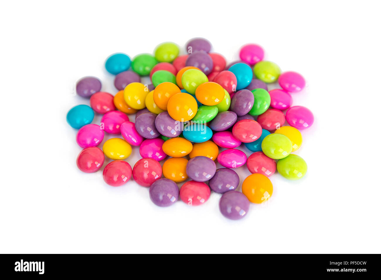 colorful chocolate coated candy isolated on white background Stock