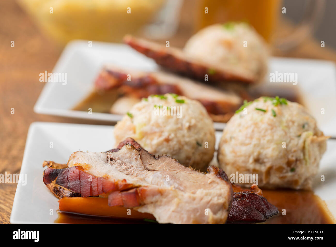 bavarian roasted pork with dumplings Stock Photo Alamy