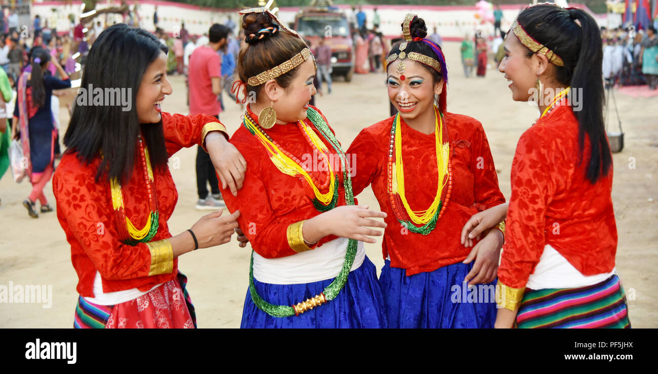 Gandhinagar, India - March 9, 2018: Sikkim girls from Nepalese community dressed in traditional attire having fun. Stock Photo