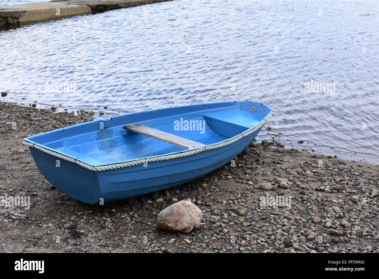 Blue Rowing Boat at Plockton, Scotland Stock Photo