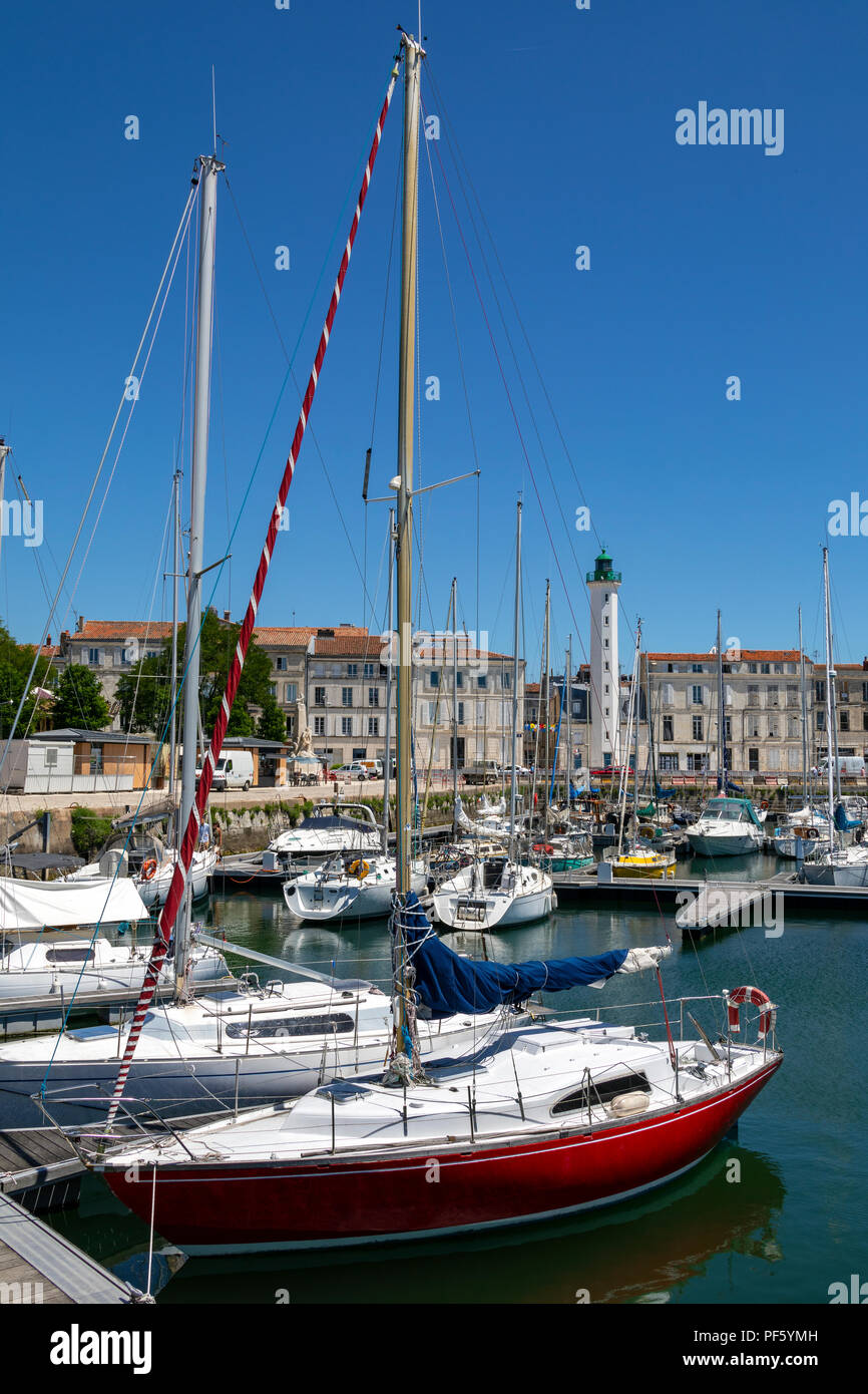 Lighthouse and marina in the Vieux Port of La Rochelle on the coast of the Poitou-Charentes region of France. Stock Photo