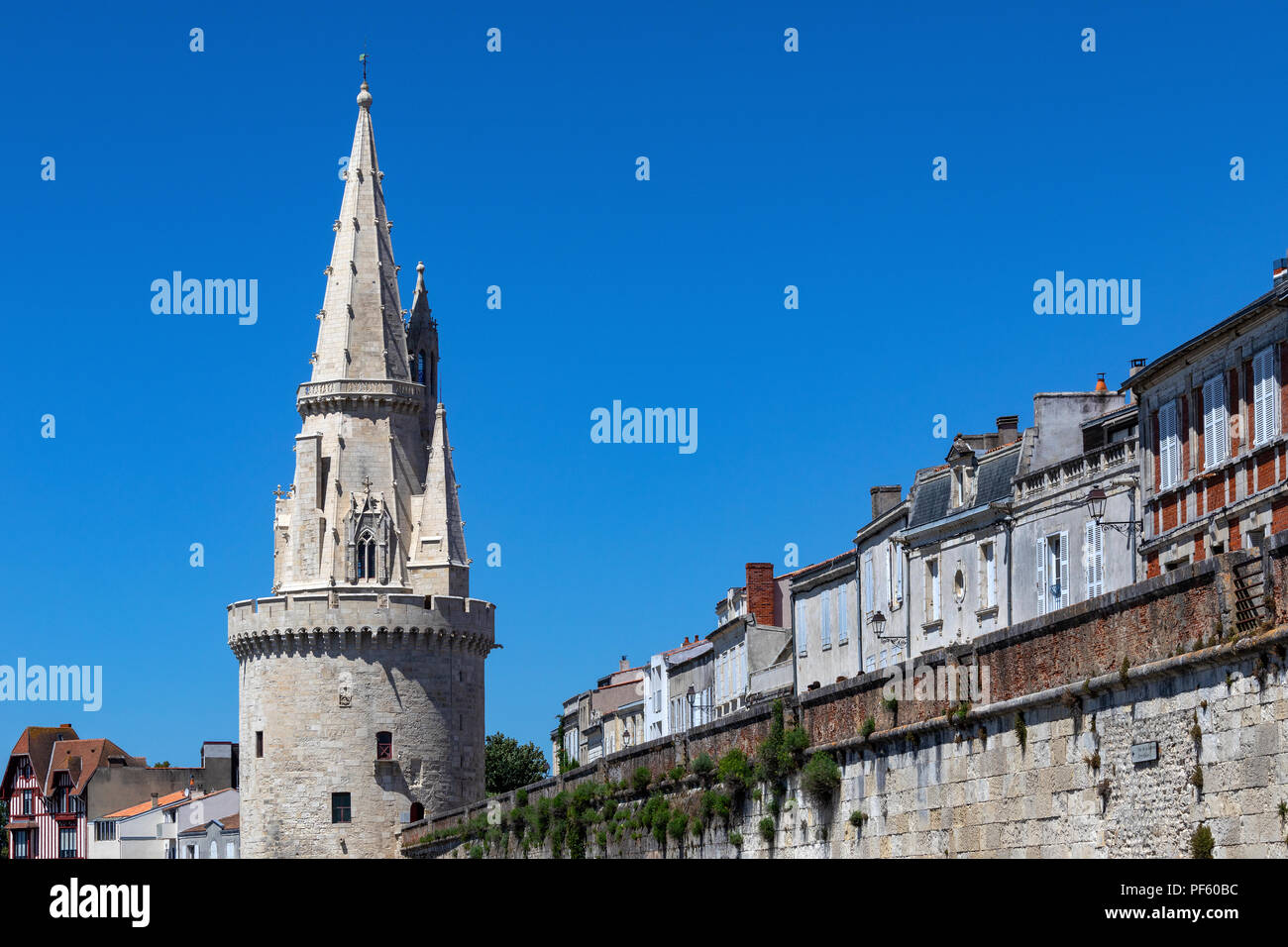 La Tour de la Lanterne or Tower of the Lantern in the Vieux Port in La Rochelle on the coast of the Poitou-Charentes region of France. Stock Photo