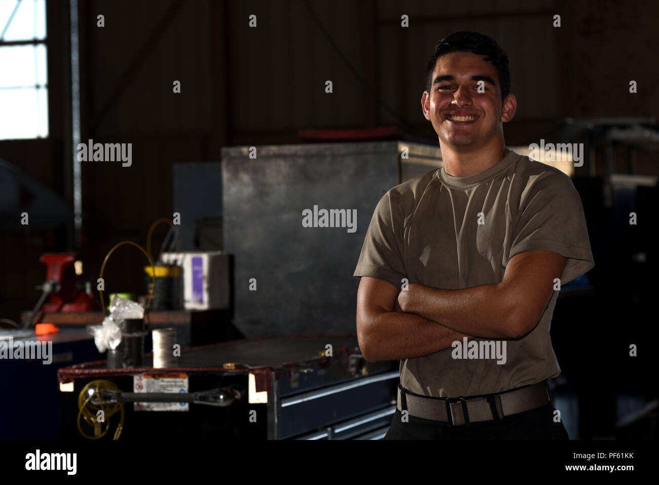 U.S. Air Force Airman 1st Class Jimmy Knutson, 20th Equipment Maintenance Squadron tactical aircraft maintainer, stands next to toolboxes in his work center at Shaw Air Force Base, S.C., Aug. 10, 2018. Knutson and other Airmen from across the base received the opportunity to share their ideas of what it means to serve in the Air Force. (U.S. Air Force photo by Senior Airman Kathryn R.C. Reaves) Stock Photo