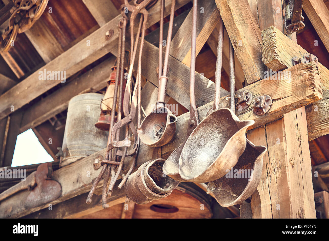 Old and oxide tools in a farm Stock Photo