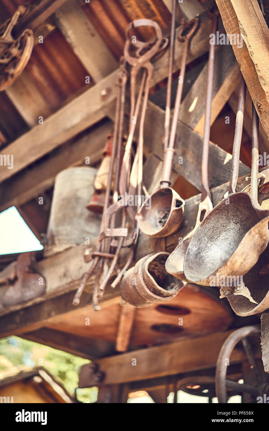 Old and oxide tools in a farm Stock Photo