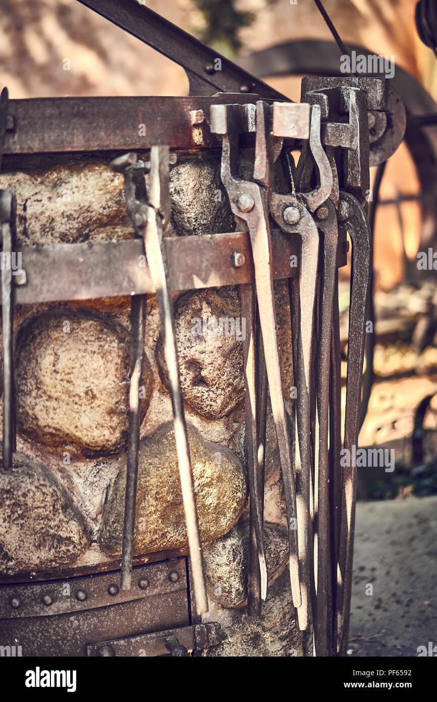 Old and oxide tools in a farm Stock Photo