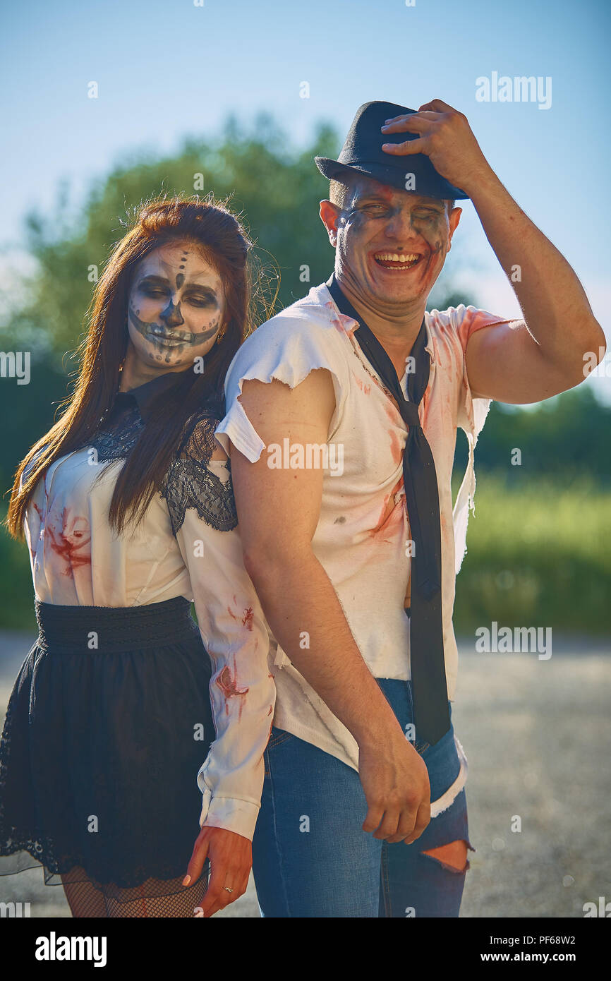 young people stand on the street dressed as zombies Stock Photo Alamy