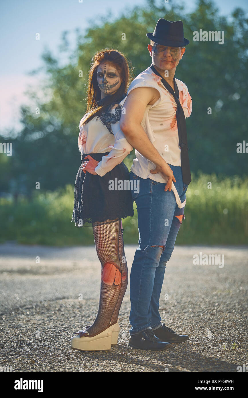 young people stand on the street dressed as zombies Stock Photo Alamy