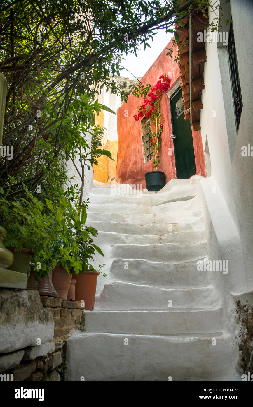 Anafiotika neighborhood in Athens was once construction workers homes and reflects origins in Cycladic architecture of the Greek Islands. Stock Photo