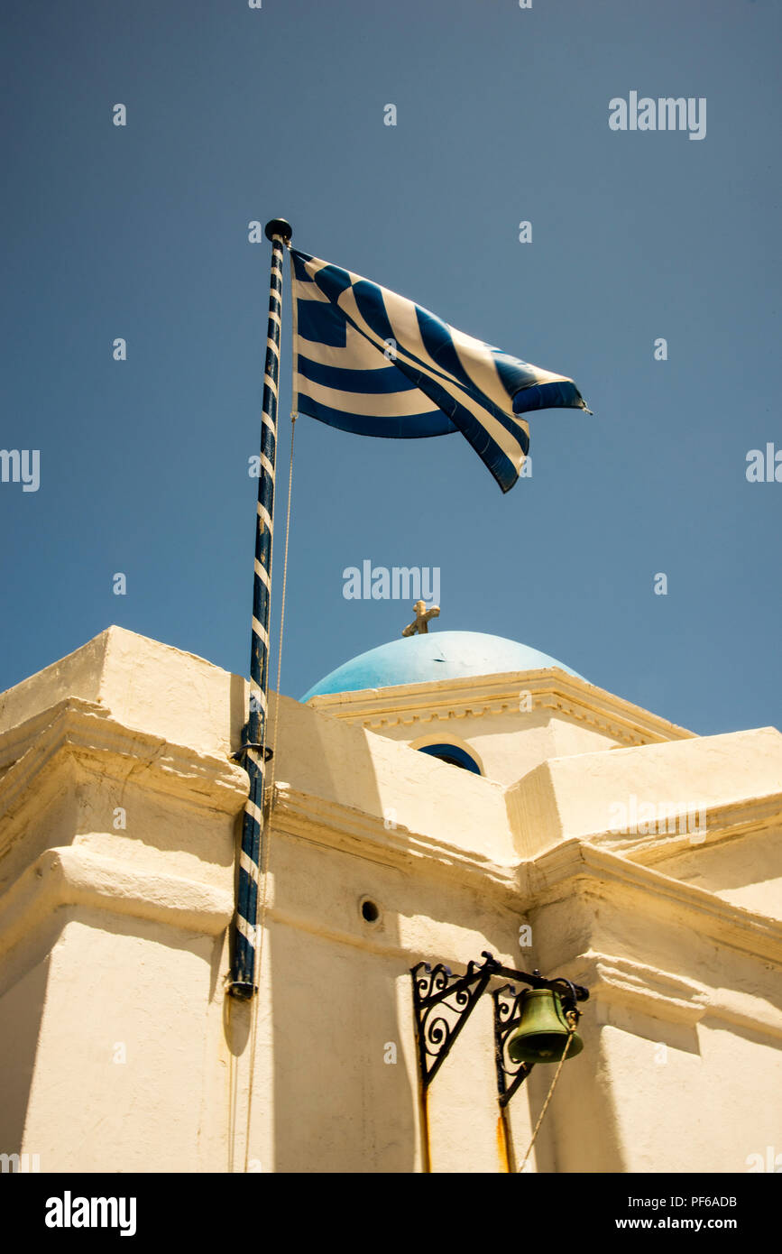 blue white and green flag with bell