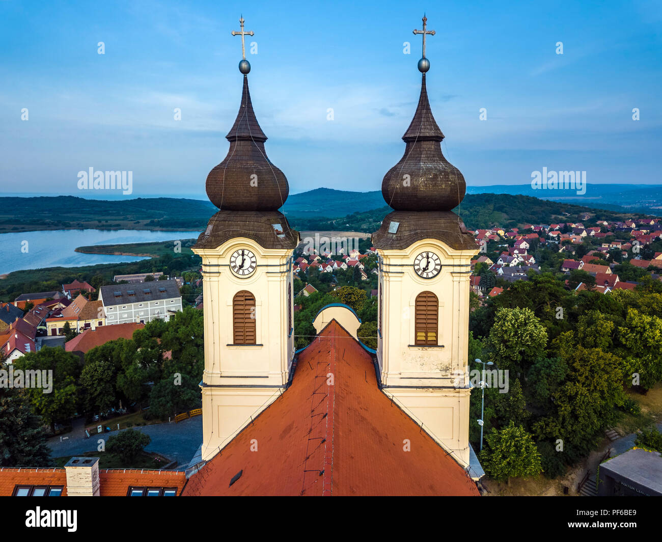 Tihany, Hungary - The two clock towers of the famous Benedictine Monastery of Tihany (Tihany Abbey) at sunrise Stock Photo