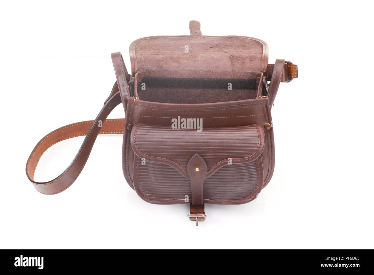 Leather hunting bag with brown ornament with patronage on white