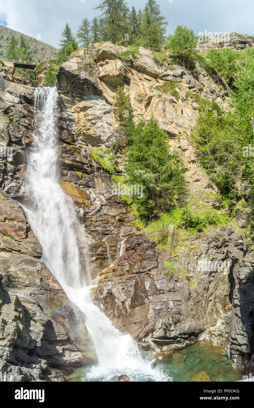 waterfall in the mountains among the rocks Stock Photo - Alamy