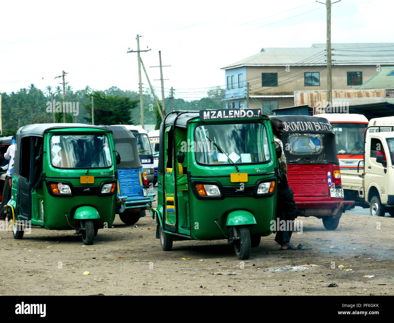 Tuk-tuk three wheeler taxis in a suburb of Dar es Salaam, the commercial capital of Tanzania, East Africa Stock Photo