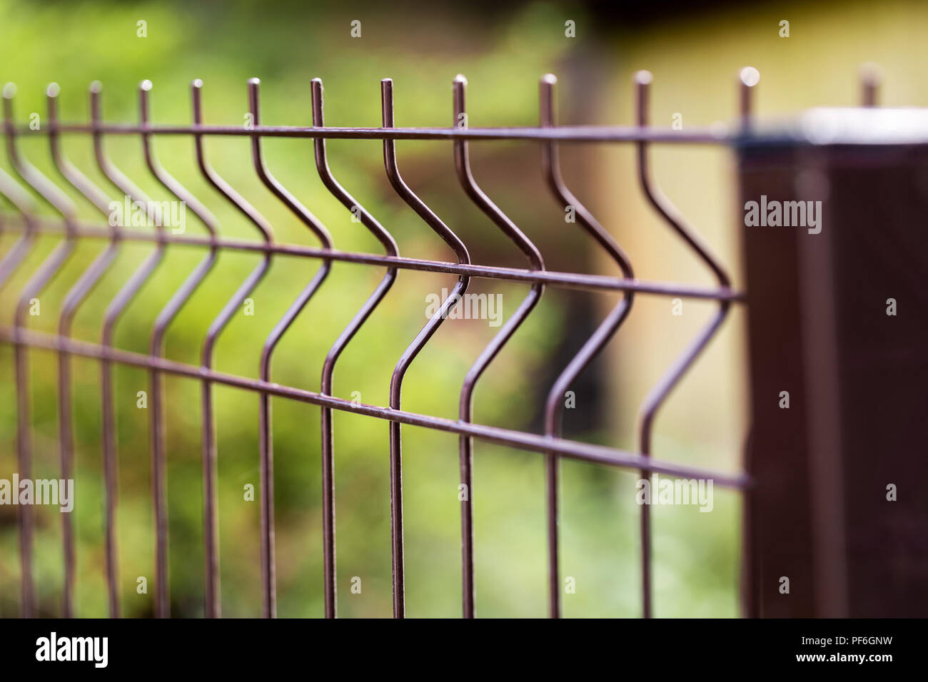 welded metal wire mesh fence closeup Stock Photo