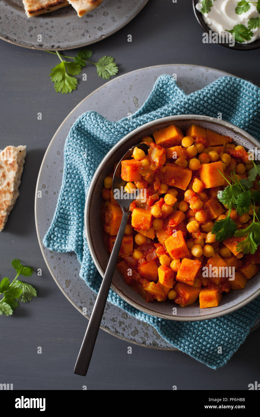 sweet potato and chickpea curry with naan bread Stock Photo Alamy