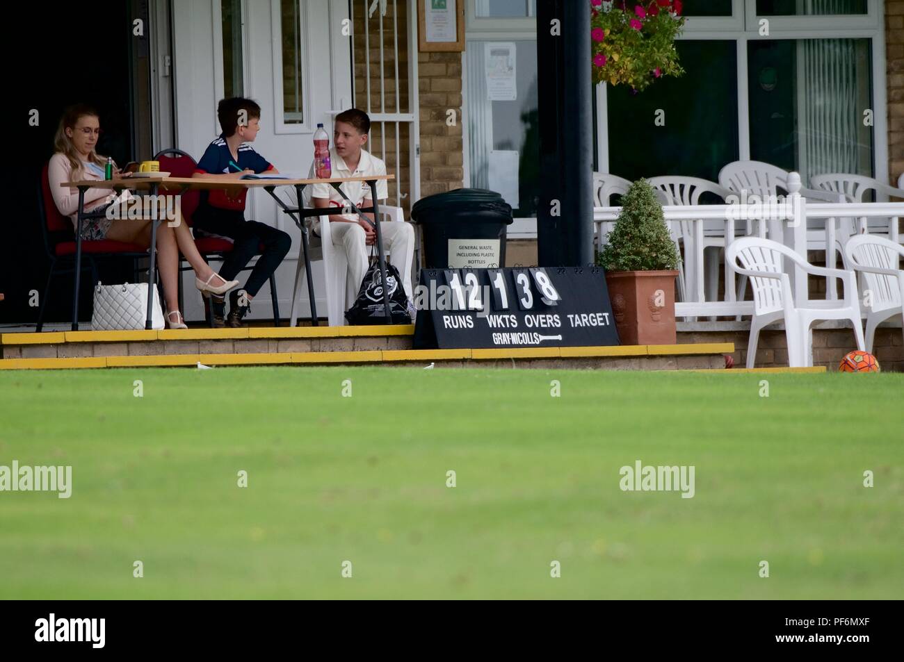 The scoreboard in a second eleven cricket match between Charlesworth and Chisworth cricket club and Pott Shrigley. Stock Photo