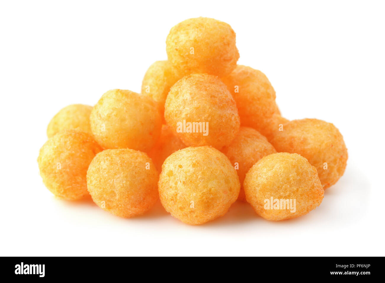 Heap of cheese puff balls isolated on white Stock Photo
