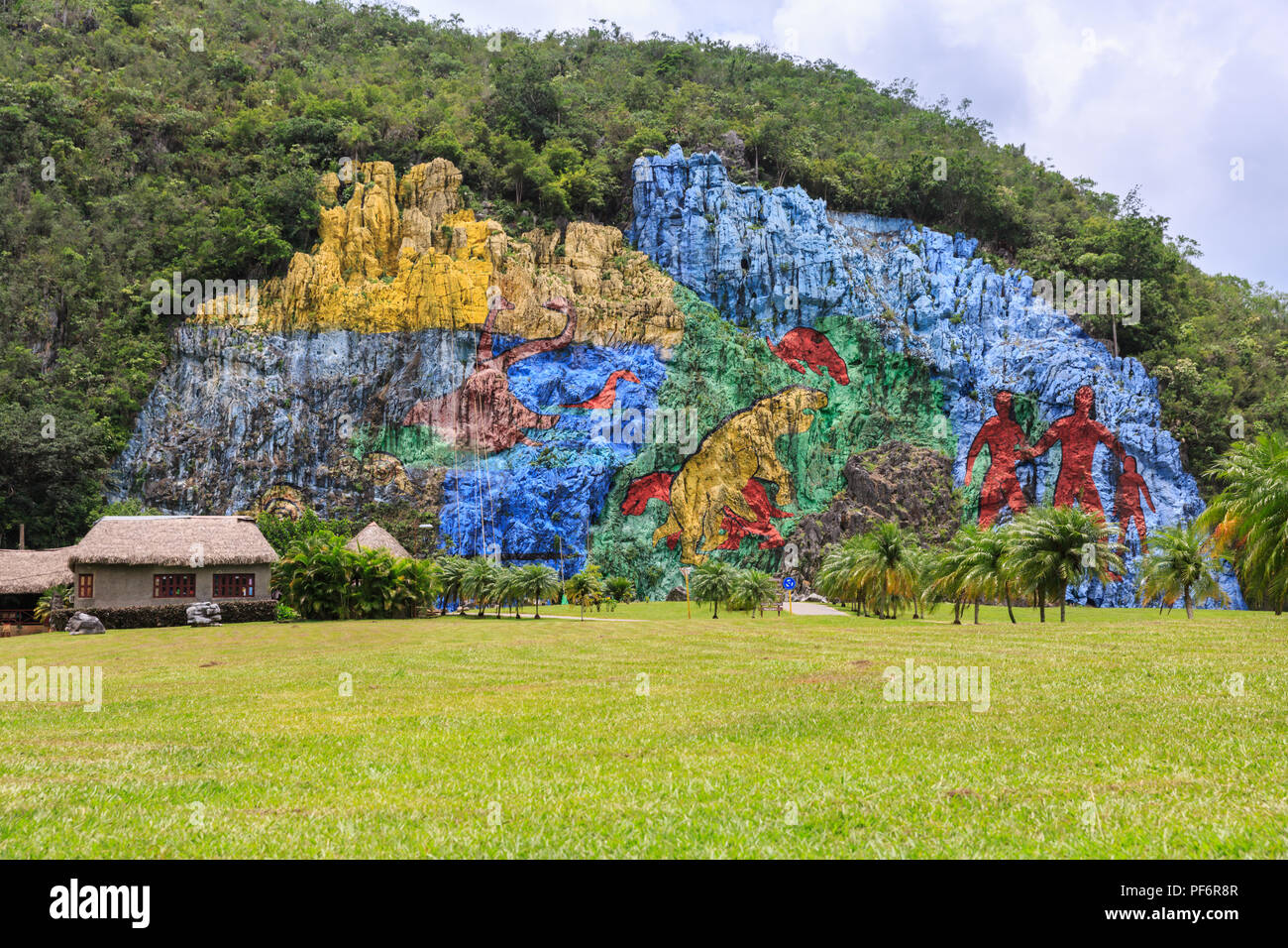 Tourist attraction, giant stone wall painting made to look like a prehistoric work, in Parque Nacional Viñales, Sierra de Viñales, Cuba Stock Photo