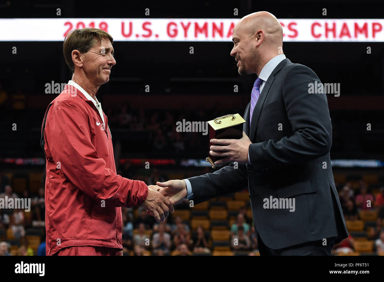 Boston, Massachussetts, USA. 18th Aug, 2018. BRETT MCCLURE (right) presents MARK WILLIAMS (left) with the award for Coach of the Year following the competition held at TD Garden in Boston, Massachusetts. Credit: Amy Sanderson/ZUMA Wire/Alamy Live News Stock Photo