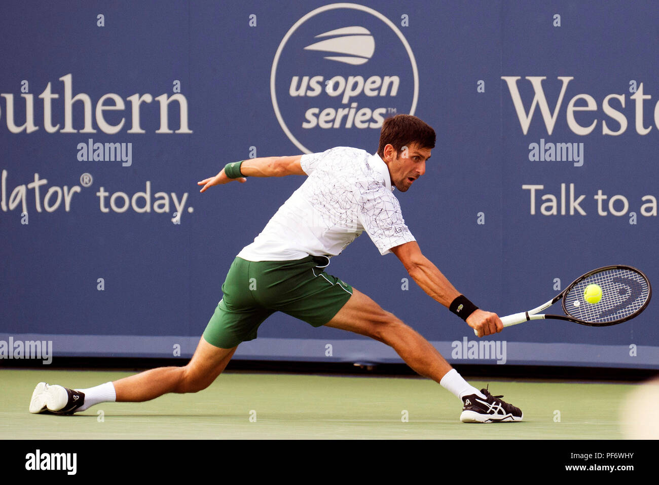 Mason, Ohio, USA. August 19, 2018: Novak Djokovic (SRB) hits the ball back to Roger Federer (SUI) at the Western Southern Open in Mason, Ohio, USA. Brent Clark/Alamy Live News Stock Photo