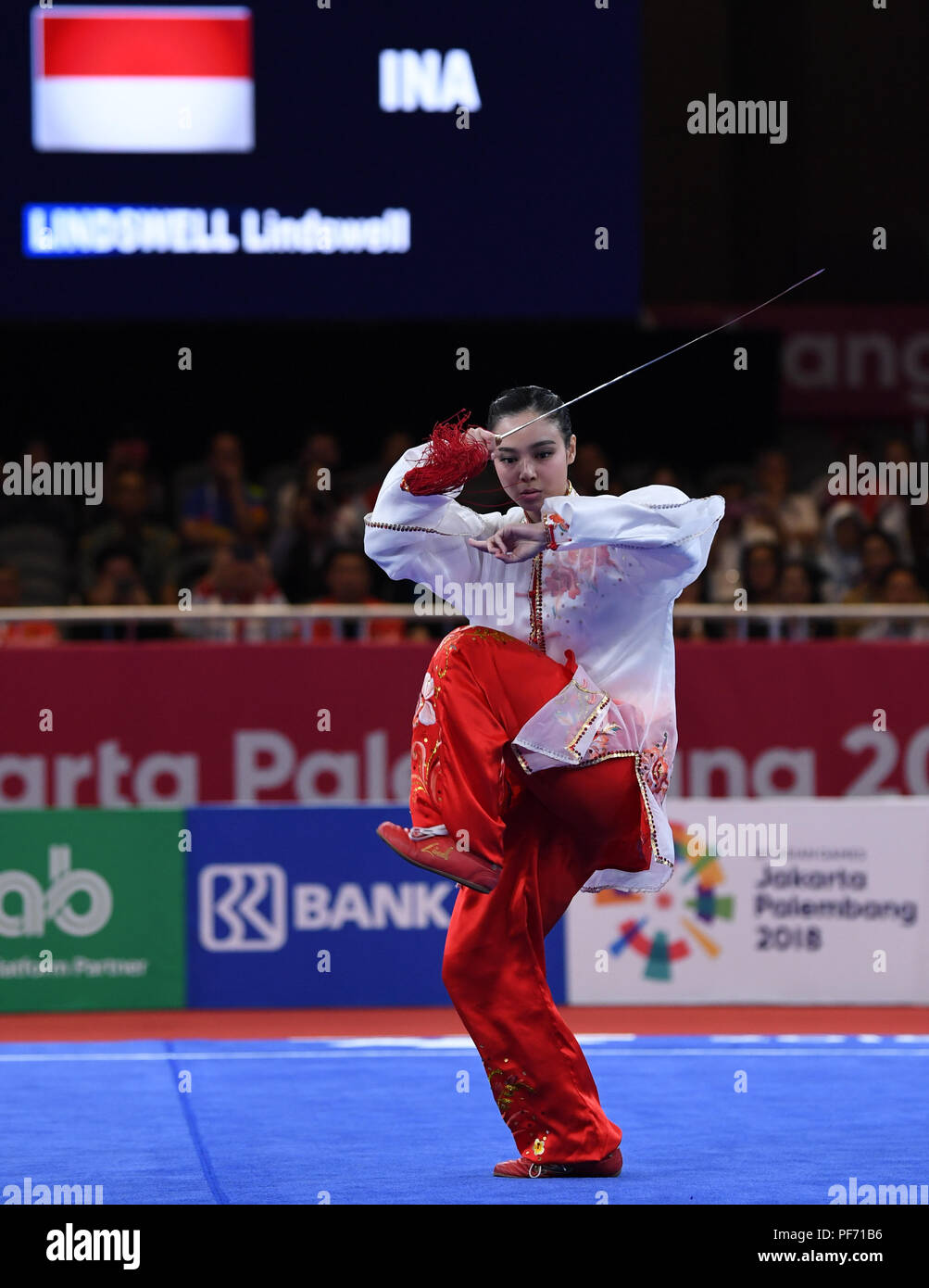 (180820) -- JAKARTA, Aug. 20, 2018 (Xinhua) -- Lindswell Lindswell of Indonesia competes during Women's Taijijian contest in the 18th Asian Games in Jakarta, Indonesia, Aug. 19, 2018. (Xinhua/Pan Yulong) Stock Photo