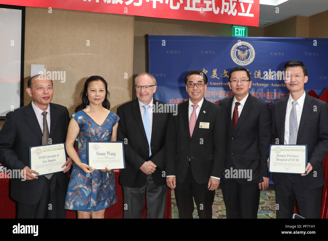 Los Angeles, California, USA. 19th August, 2018. Professor Li Hong, Susan Wang, Harrison Engle, Mayor Lam LIn, Mr. Shuangming, Vice-Consul General Chinese Consulate in Los Angeles, and Zhuyuan Fang, attending the Traditional Chinese Medicine (TCM) Service for Overseas citizens that was launched today in Los Angeles with an  Opening Ceremony and Unveiling held at the Holiday Inn in Diamond Bar, California. The project is jointly sponsored by the Jiangsu Provincial Government and the Jiangsu Provincial Institute of Traditional Chinese Medicine.  Credit: Sheri Determan/Alamy Live News Stock Photo