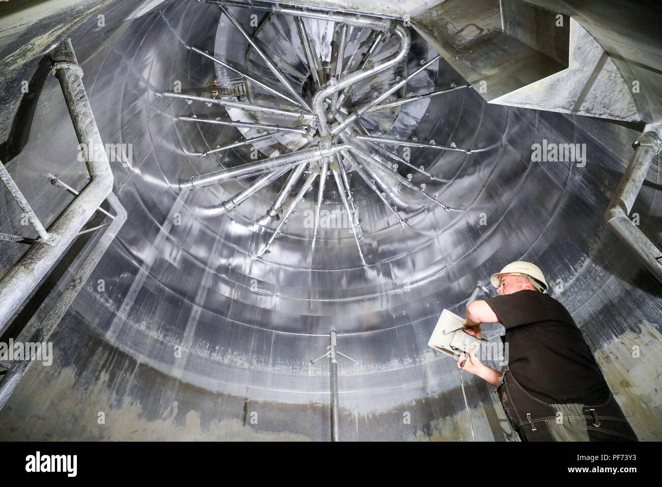 August 18 Germany Chemnitz An Employee Stands In The Flue Gas Scrubber In The Northern Combined Heat And Power Plant Which Was Shut Down For Conversion Work The Energy Supplier Eins