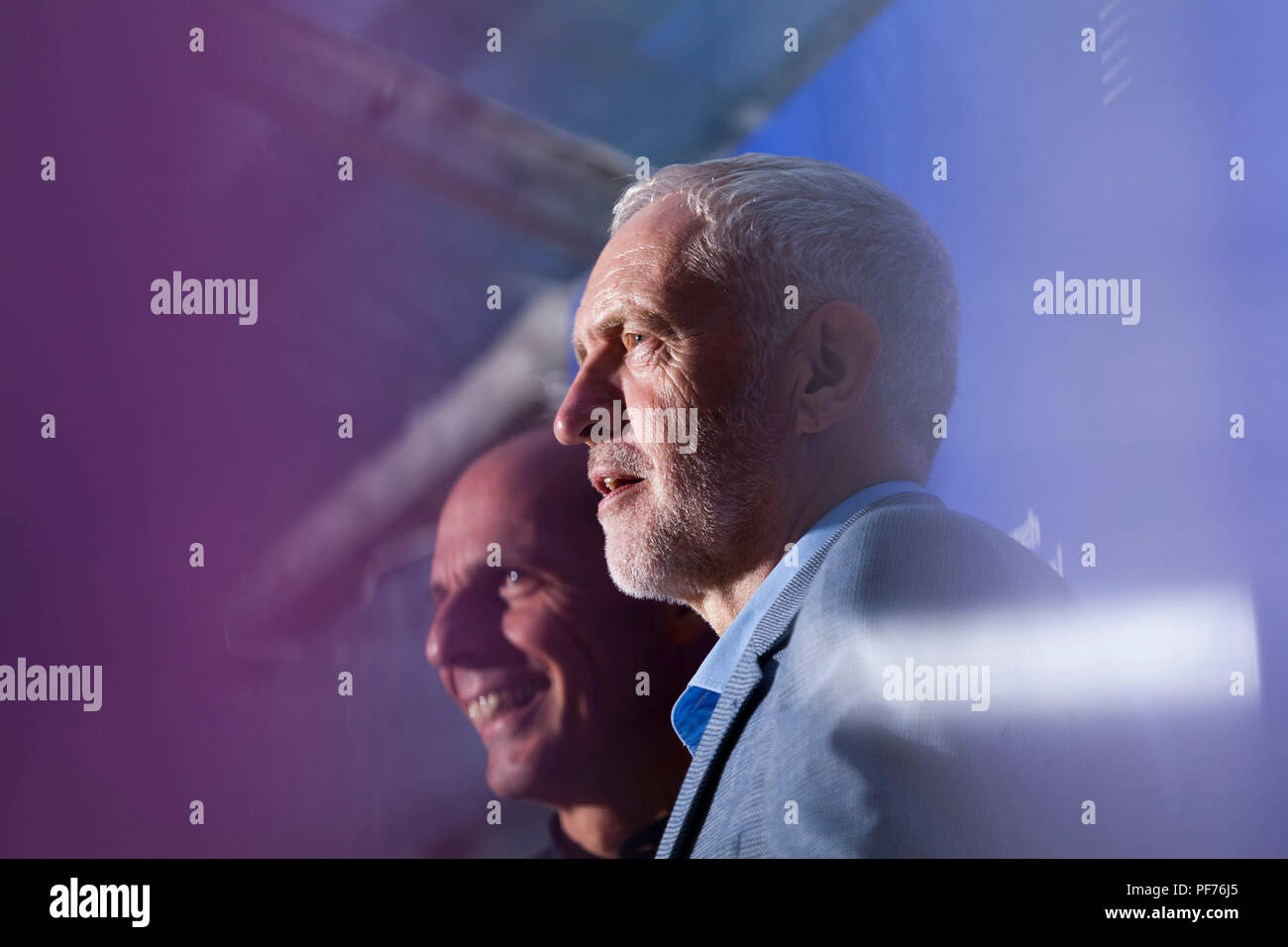 Edinburgh, UK. 20th August, 2018. Jeremy Corbyn (foreground) with Yanis Varoufakis. Pictured at the Edinburgh International Book Festival. Edinburgh, Scotland. At the Edinburgh event, DiEM25 co-founder Yanis Varoufakis discussed with the Labour leader the renaissance of the left and the future of democracy.   Picture by Gary Doak / Alamy Live News Stock Photo