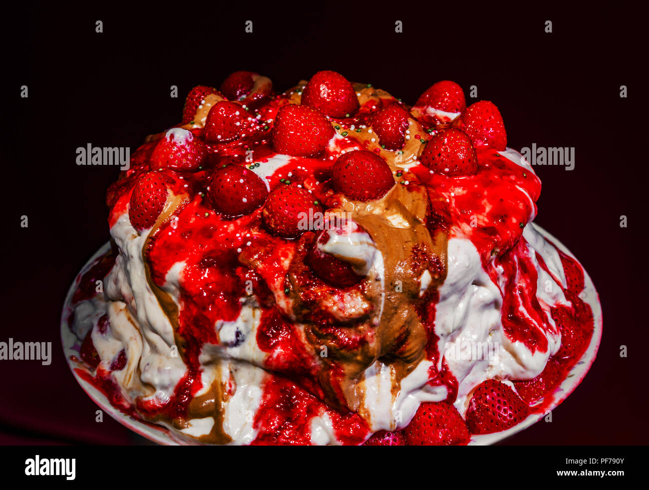 Homemade sweet strawberry cake isolated on dark background Stock Photo ...