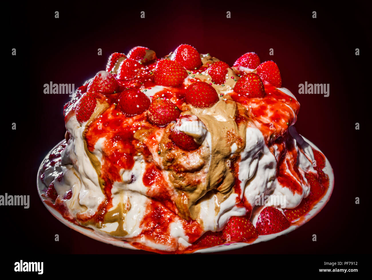 Homemade sweet strawberry cake isolated on dark background Stock Photo ...