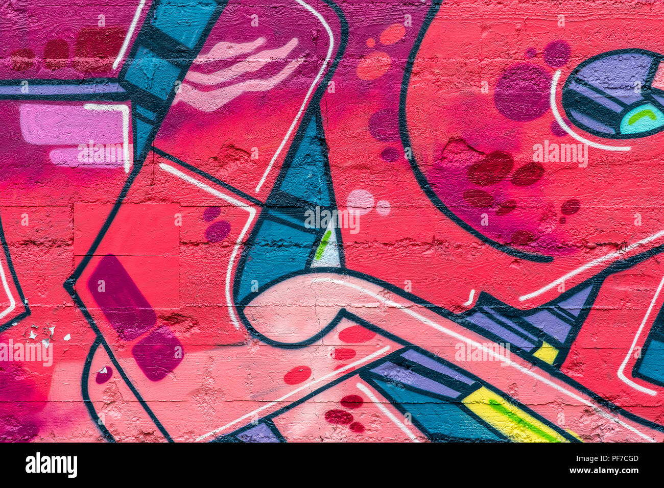 Street art. Colorful graffiti on the wall. Detail of a graffiti Stock