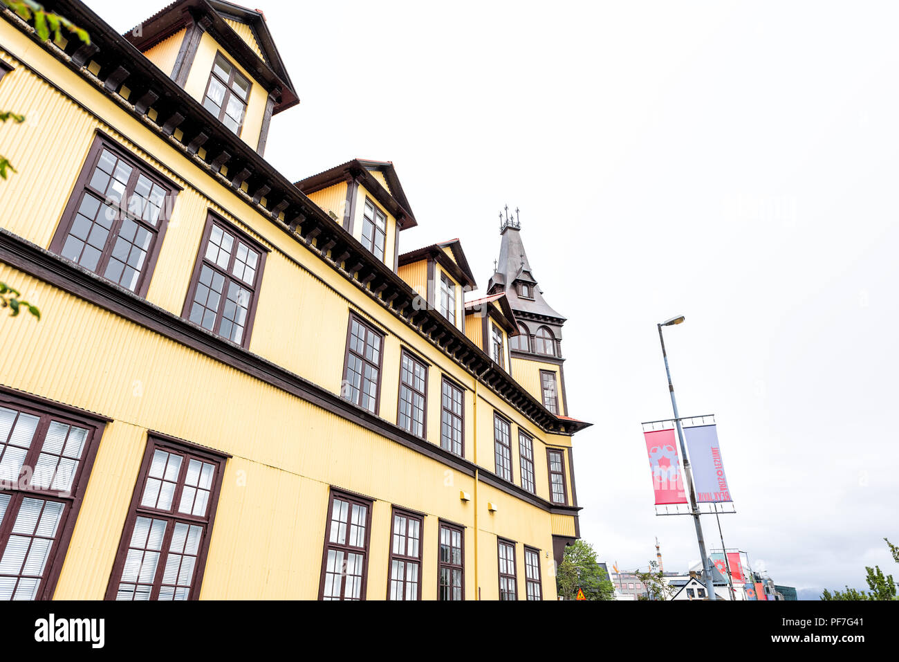 Reykjavik, Iceland June 19, 2018 Colorful yellow painted elementary