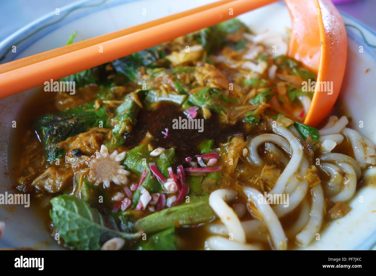 Penang Laksa or Assam Laksa (Noddle in Tangy Fish Gravy), Asam Laksa is a Special Malaysian Food Popular in Penang and Singapore Region Stock Photo